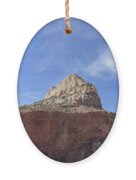 Majestic Mountain Peak Under Blue Sky Ornament