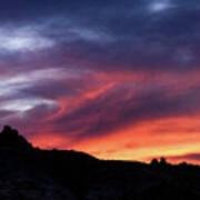 Vivid Twilight over Rocky Silhouette Poster