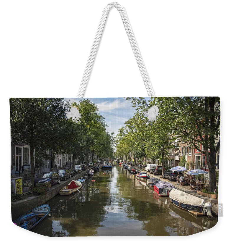 Serene Amsterdam Canal With Boats And Trees Weekender Tote Bag