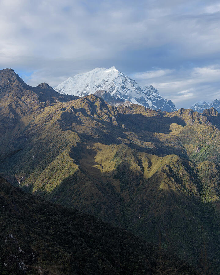 Majestic Andes Mountain Peaks Under Cloudy Sky