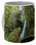 Serene Waterfall in Lush Forest Coffee Mug