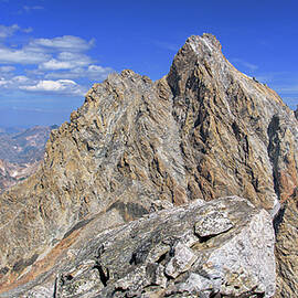 Majestic Mountain Peak Under Clear Skies by Brandon Wichmann