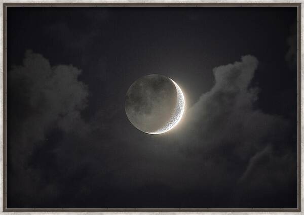 Shimmering Crescent Among Clouds Framed Print