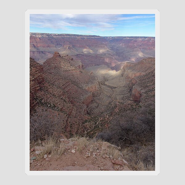 Majestic Grand Canyon Overlook Under Azure Sky Sticker