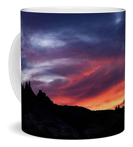 Vivid Twilight over Rocky Silhouette Coffee Mug