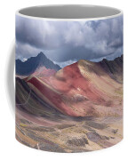 Rainbow Mountain Range Under Cloudy Skies Coffee Mug