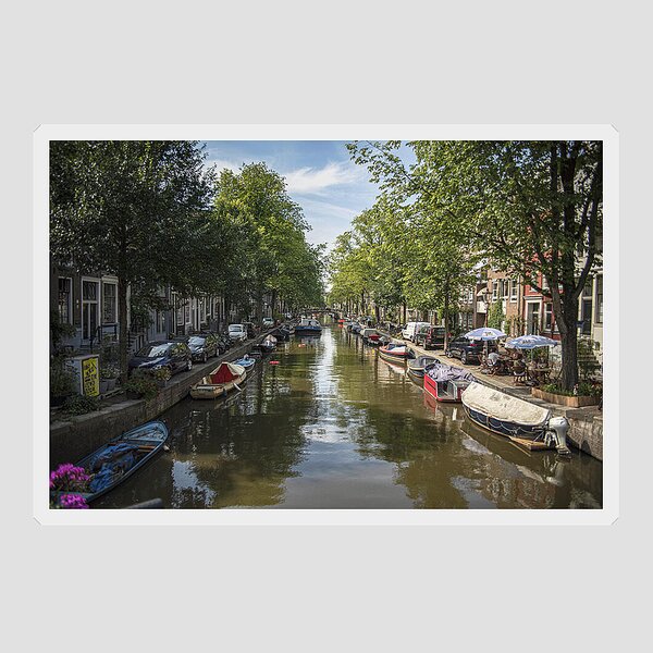 Serene Amsterdam Canal With Boats And Trees Sticker