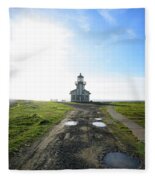 Lighthouse Under A Bright Sky Fleece Blanket