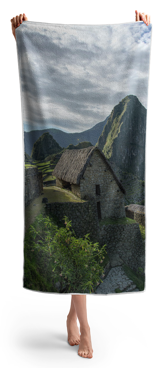 Ancient Ruins With Majestic Mountain Backdrop Beach Towel