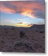 Desert Sunset Over Rugged Terrain Metal Print