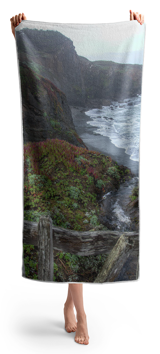 Rocky Coastline With Vibrant Foliage Beach Towel