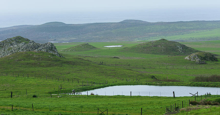 Tranquil Green Hills and Distant Sea Photograph by Brandon Wichmann