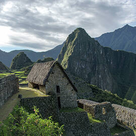 Ancient Ruins with Majestic Mountain Backdrop