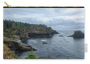 Serene Coastal Cliffs at Dawn Zip Pouch