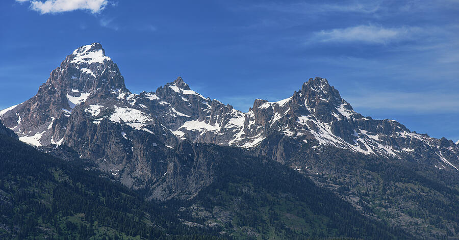 Snow-Capped Teton Mountain Peaks Under Blue Sky