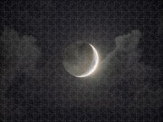 Shimmering Crescent Among Clouds Jigsaw Puzzle