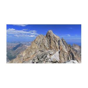 Majestic Mountain Peak Under Clear Skies by Brandon Wichmann