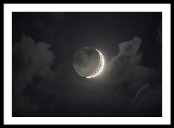 Shimmering Crescent Among Clouds Framed Print