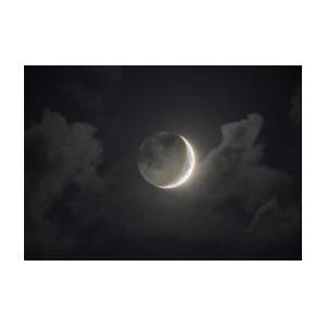 Shimmering Crescent Among Clouds by Brandon Wichmann Shimmering Crescent Among Clouds by Brandon Wichmann