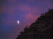 Moonlit Evening Over Silhouetted Hills Jigsaw Puzzle