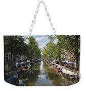 Serene Amsterdam Canal With Boats And Trees Weekender Tote Bag