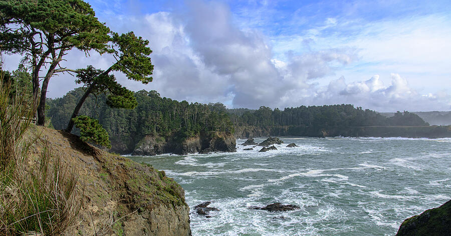 Coastal Serenity with Rugged Cliffs Photograph by Brandon Wichmann
