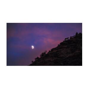 Moonlit Evening Over Silhouetted Hills by Brandon Wichmann
