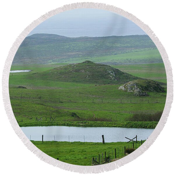 Tranquil Green Hills And Distant Sea Round Beach Towel