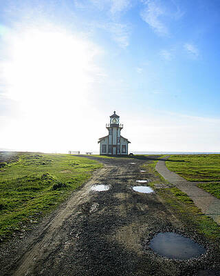 Sky Wall Art featuring the photograph Lighthouse Under A Bright Sky by Brandon Wichmann