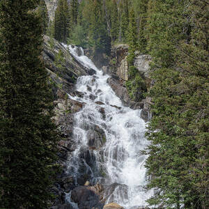 Waterfall Amidst Forest Landscape by Brandon Wichmann Waterfall Amidst Forest Landscape by Brandon Wichmann
