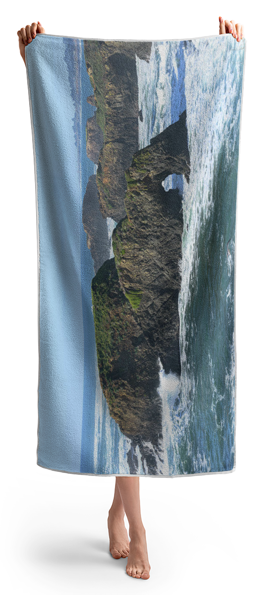 Majestic Coastal Rock Formations Beach Towel