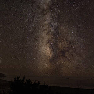 Milky Way Over Tranquil Shoreline by Brandon Wichmann