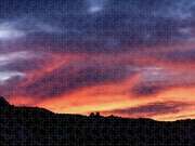 Vivid Twilight over Rocky Silhouette Jigsaw Puzzle