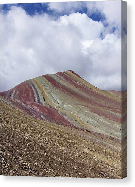 Colorful Rainbow Mountain Under Cloudy Sky Canvas Art Print by Brandon Wichmann
