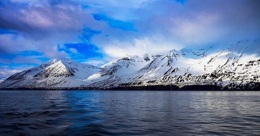 Snowy Peaks Across Still Water