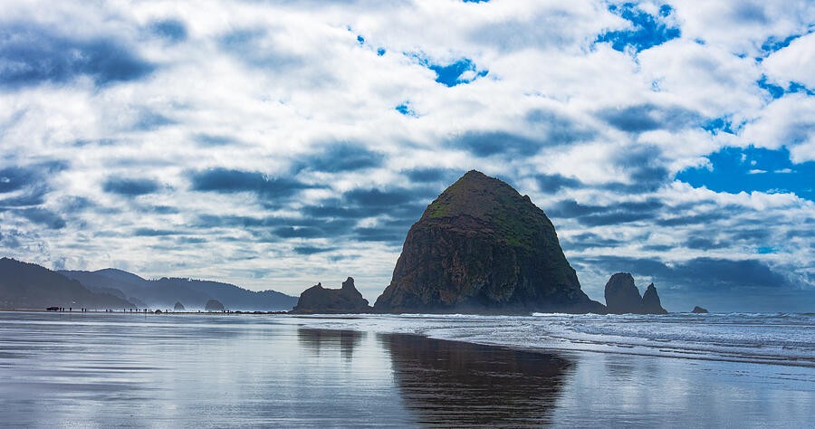 Sea Stack Reflected in the Wet Sand