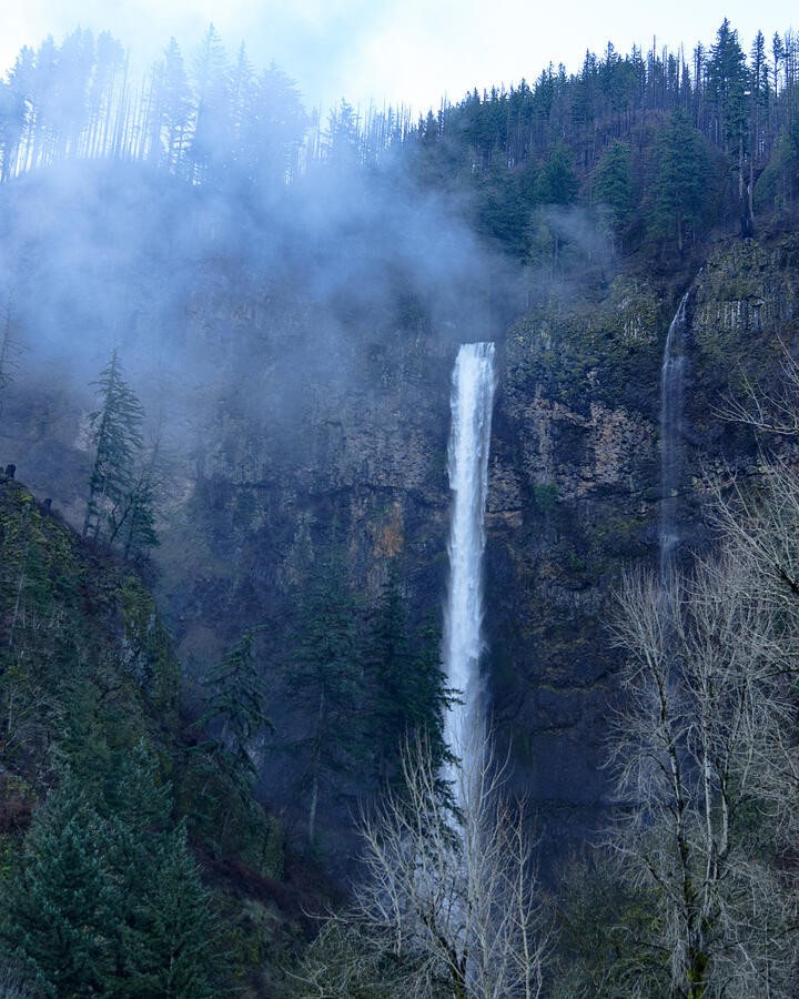 A Misty Veil Across the Waterfall