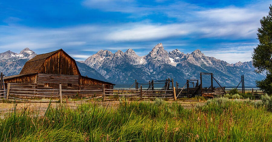 The Old Barn Beneath a Wide Mountain Sky