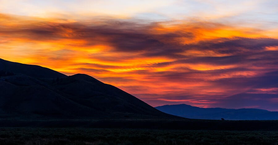 Orange Light Behind the Dark Hills