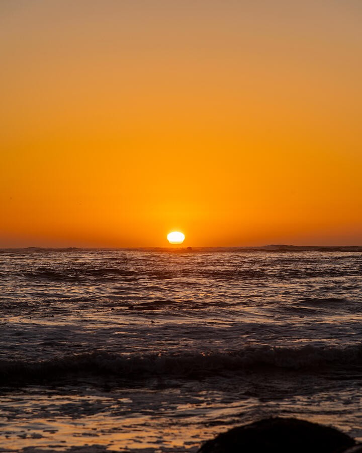 A Golden Sun Above the Rolling Sea