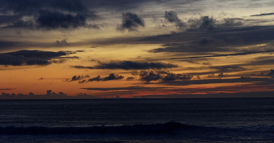 Golden Light Beneath the Coastal Clouds