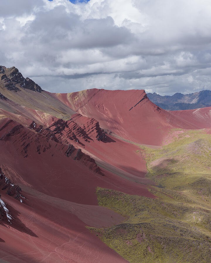 A Red Ridge Above the Green Valley