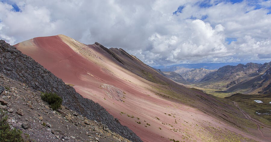 A Rust-Colored Ridge Along the Valley