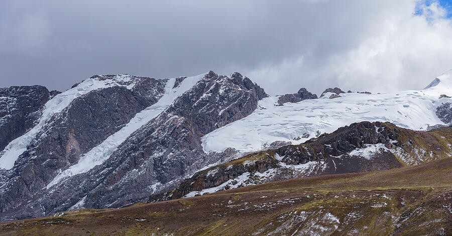 Snow Across the Jagged Mountain Wall