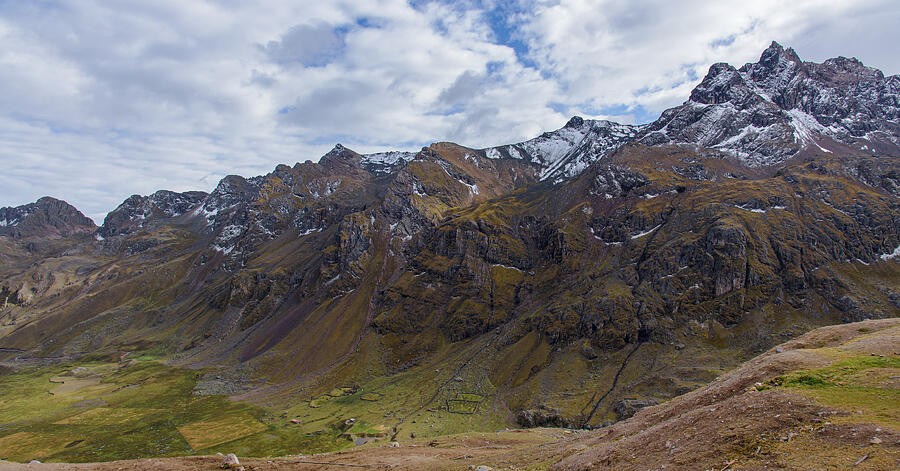 A Winding Valley Beneath the Snowy Ridge