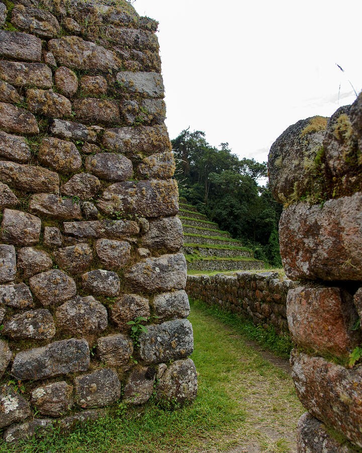 A Passage Between the Weathered Stone Walls