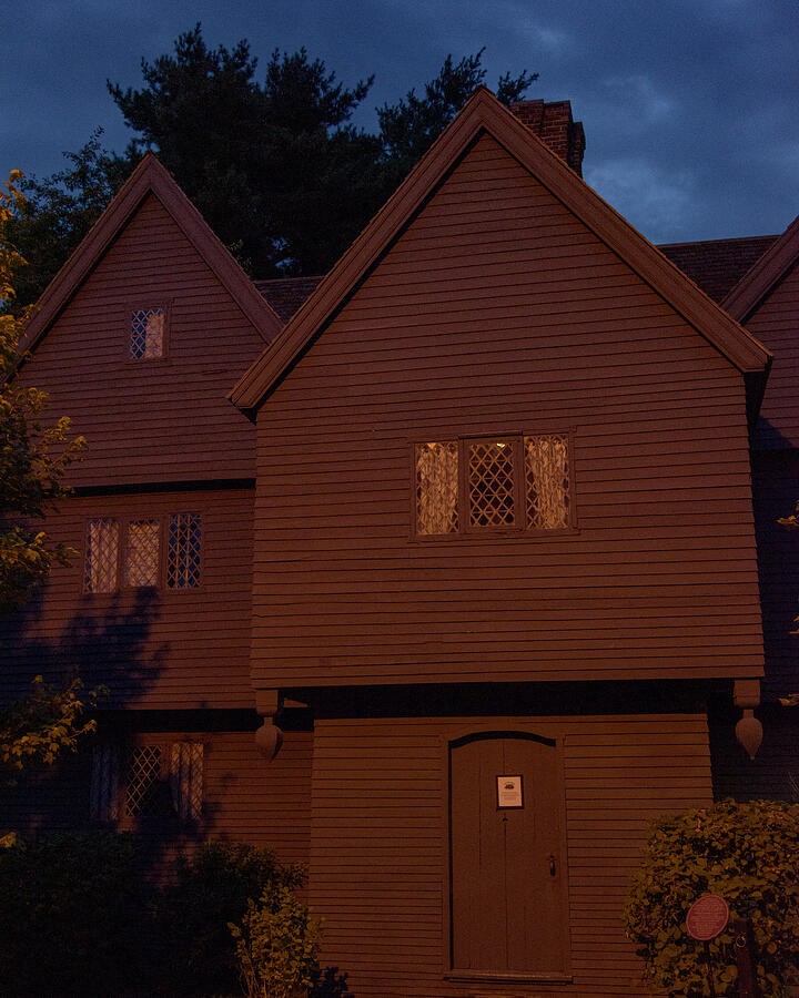 Warm Light on a Gabled Wooden House