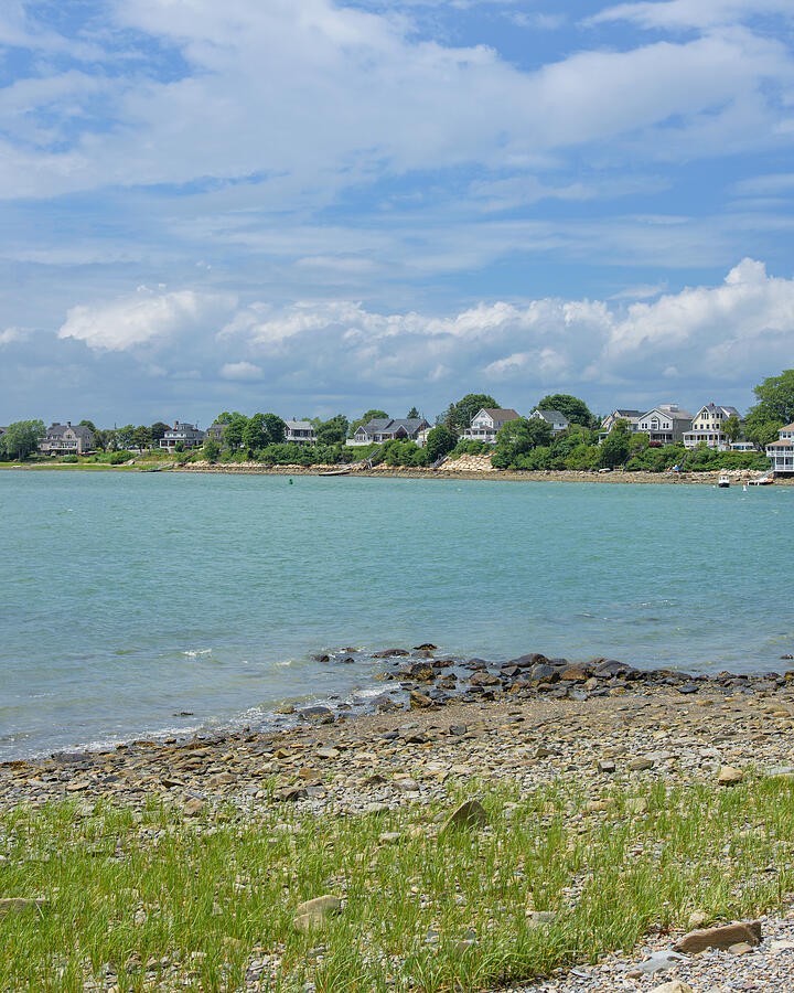 Shoreline Homes Across the Pale Blue Bay