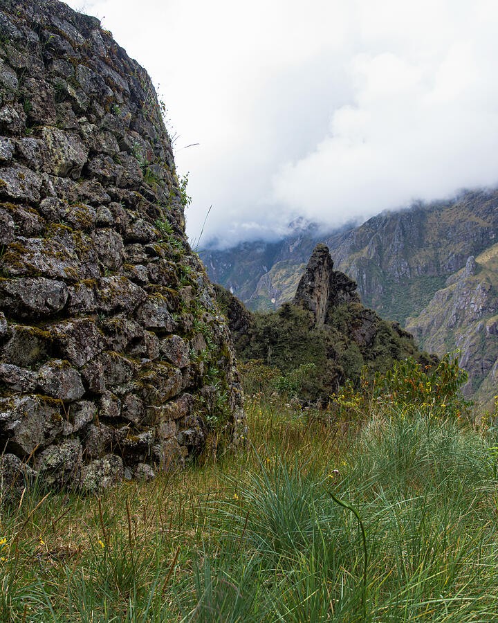 Weathered Masonry Against the Clouded Mountains