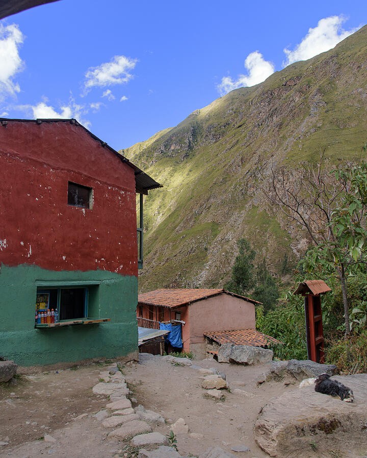 A Red Mountain Building Beside the Stone Path